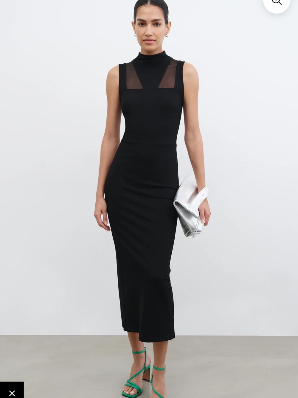 Sleek Sleeveless Black Midi Dress with Sheer Neck Insets